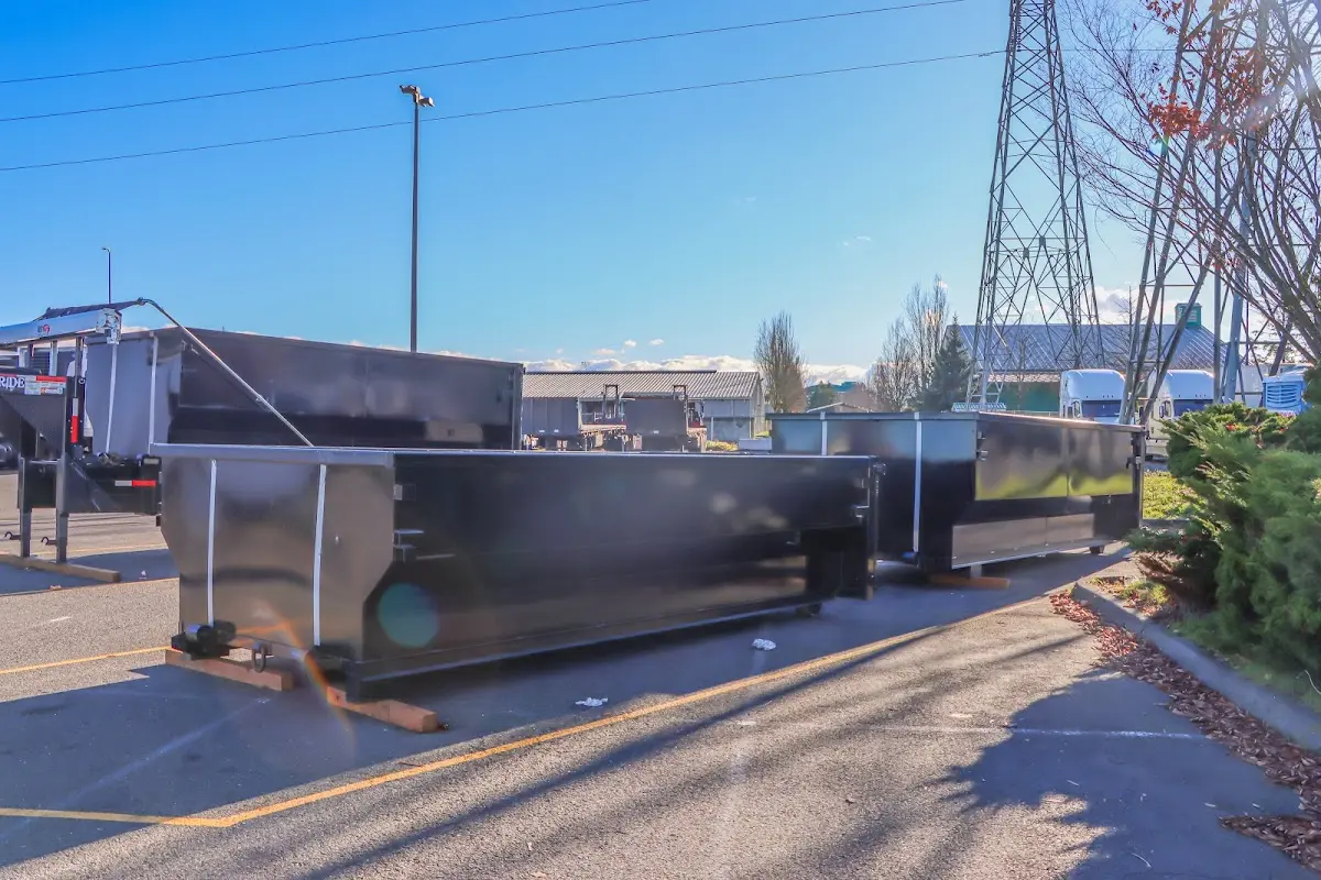 Roll-off dumpster ready for waste disposal at job site for Cleanout Dumpster Rental in Greensboro